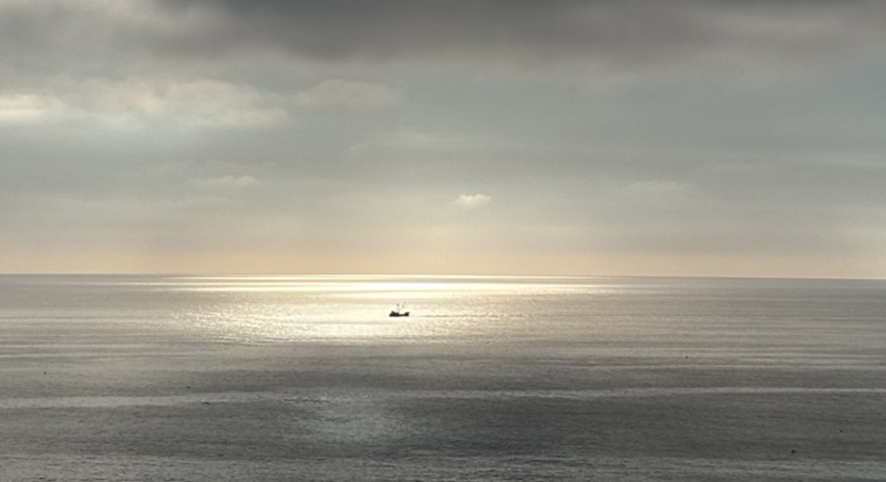 Photo of a fishing ship at sea